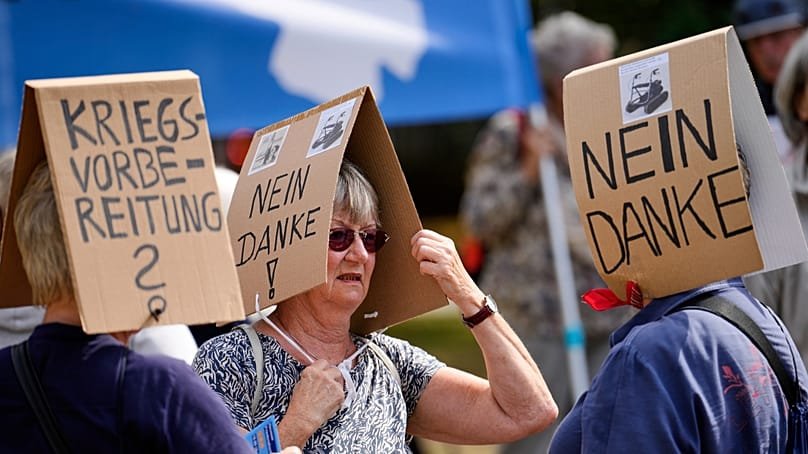 Demonstrators protest against what they believe to be preparations for war, outside the North Rhine-Westphalia State Parliament, 4 September 2025