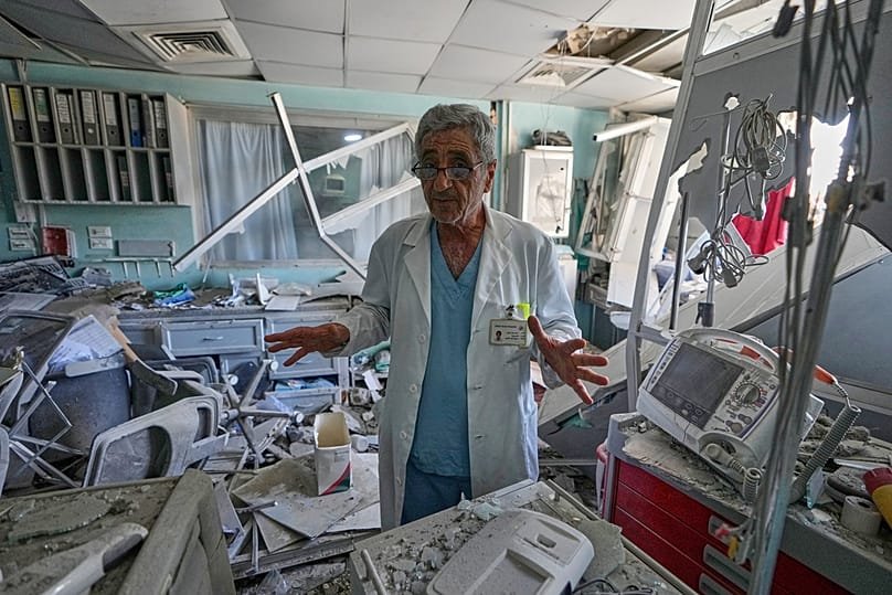 A doctor gestures at a damaged laboratory of Jabal Amel Hospital, following Monday's Israeli airstrike that hit a nearby building in the southern port city of Tyre, Lebanon.
