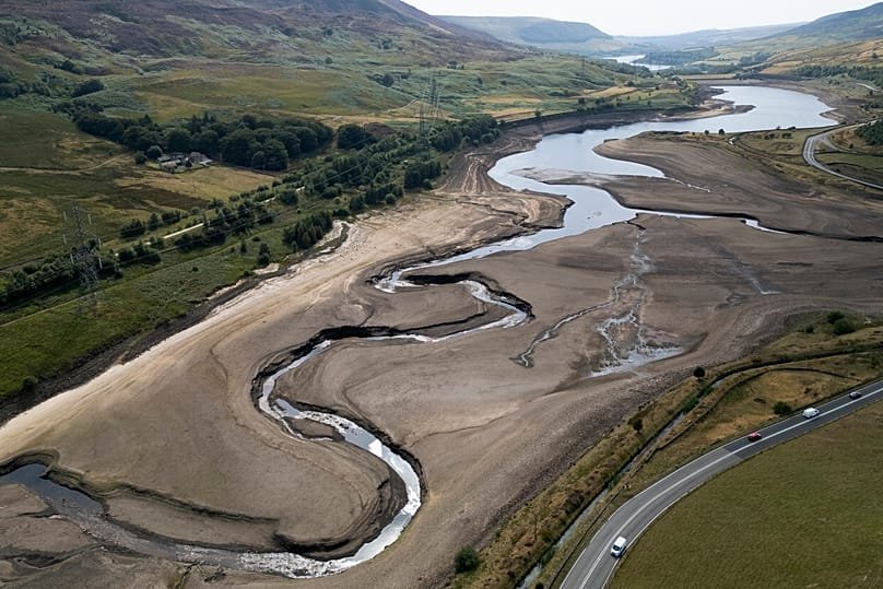 FILE - Woodhead reservoir is visible amid a drought near Manchester, England, Thursday, Aug. 13, 2026. 