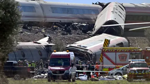 EPA Emergency services work at the site of a train crash between two high-speed units, a Renfe AVE train and an Iryo train around 150 km south of Madrid between Urda and Los Yebenes in the province of Toledo, on October 28, 2026.